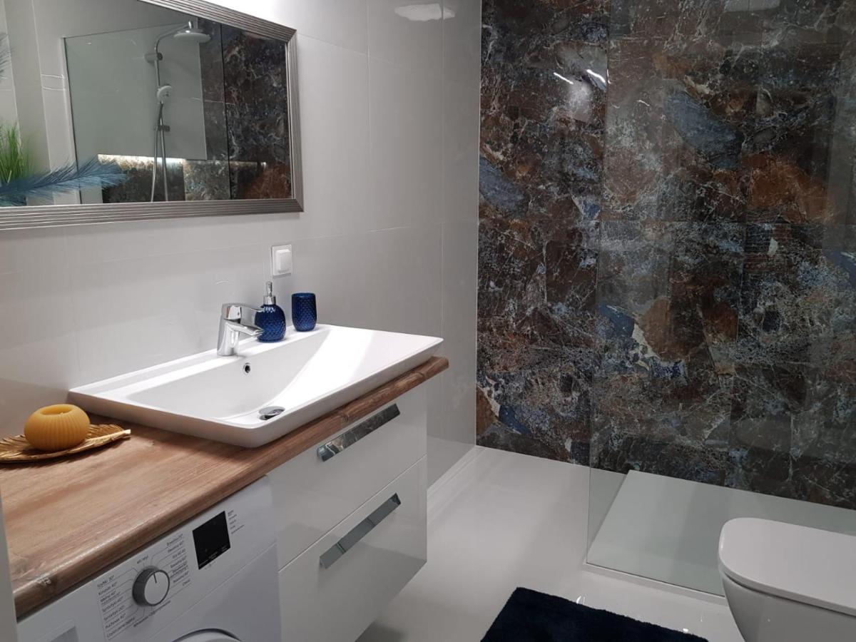 Apartament City View Wes Quality Suite بوزنان المظهر الخارجي الصورة