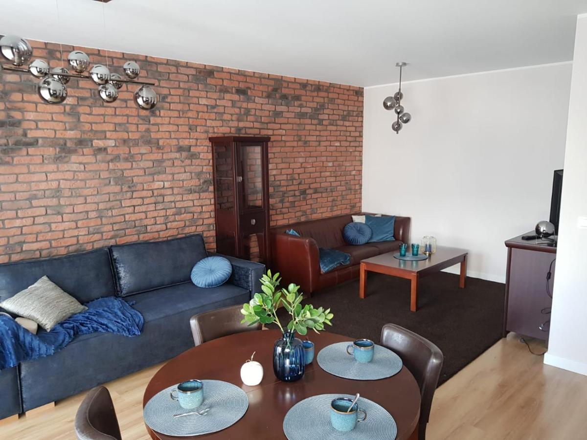 Apartament City View Wes Quality Suite بوزنان المظهر الخارجي الصورة