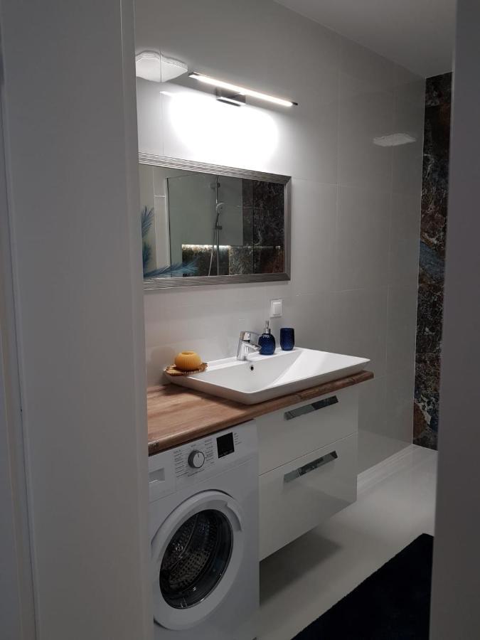 Apartament City View Wes Quality Suite بوزنان المظهر الخارجي الصورة