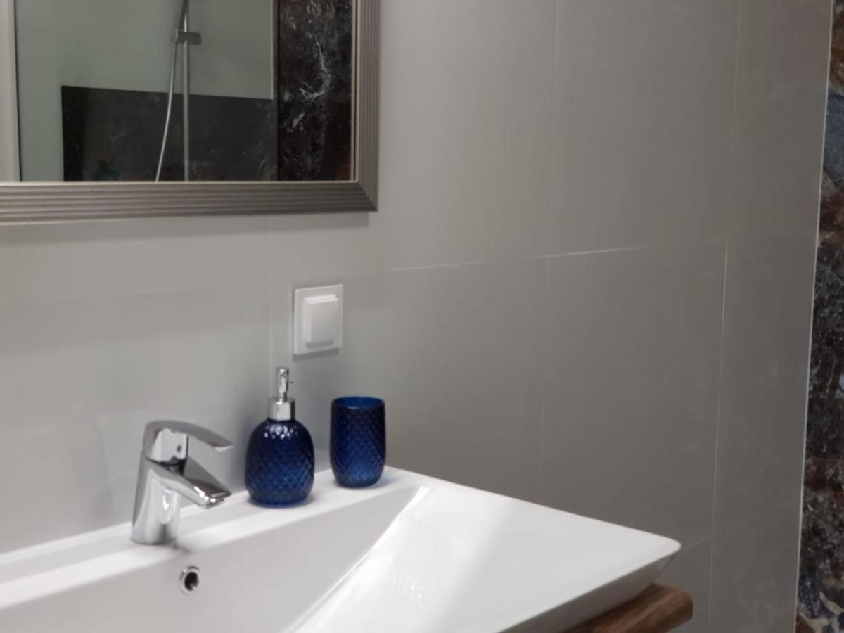 Apartament City View Wes Quality Suite بوزنان المظهر الخارجي الصورة